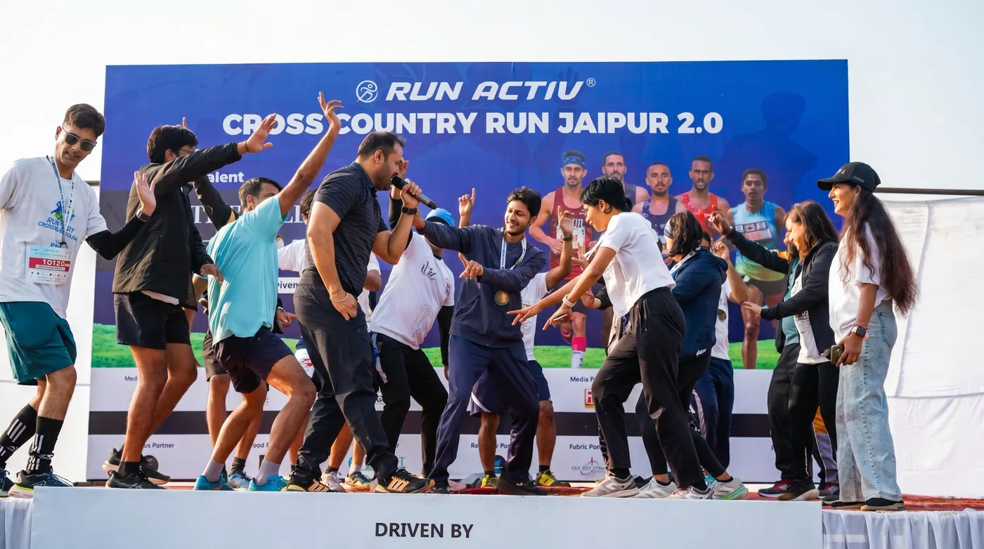 Runners dancing on stage after prize distribution at CCR Jaipur 2.0.