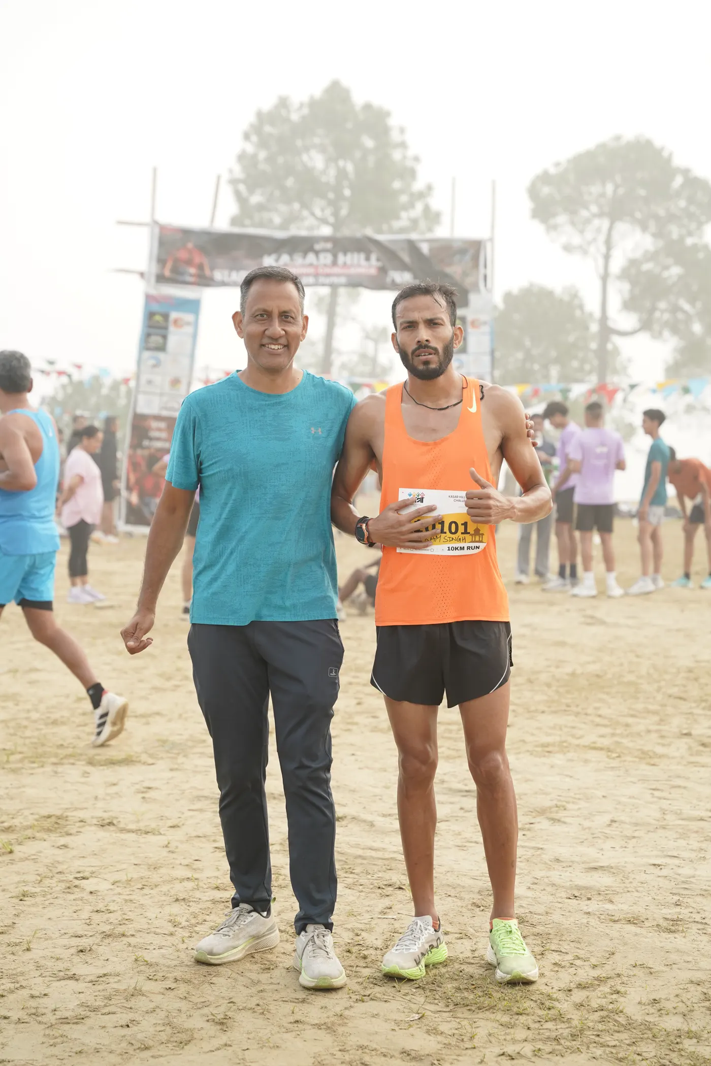 Two finishers smiling after the race.