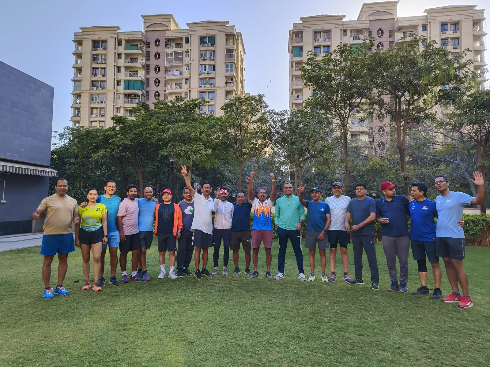 Runners gathered on a lawn for a RunActiv training workshop.